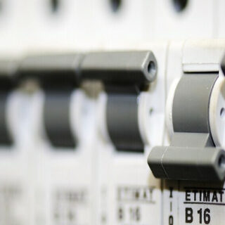 a breaker box with a tripped fuse