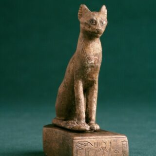 an ancient figurine of a cat